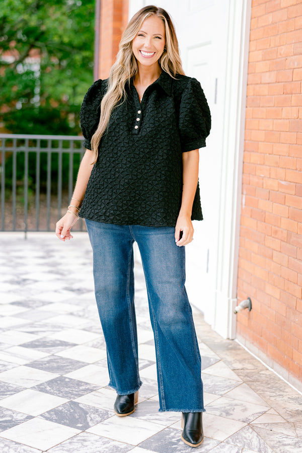 Chic Soul plus size clothing, black top with bubble sleeves and a geometric texture throughout the top 
