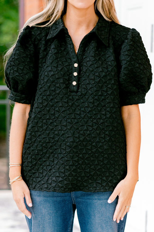Chic Soul plus size clothing, black top with bubble sleeves and a geometric texture throughout the top 