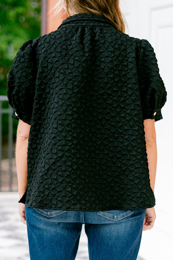 Chic Soul plus size clothing, black top with bubble sleeves and a geometric texture throughout the top 