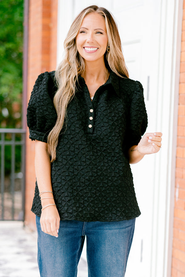 Chic Soul plus size clothing, black top with bubble sleeves and a geometric texture throughout the top 