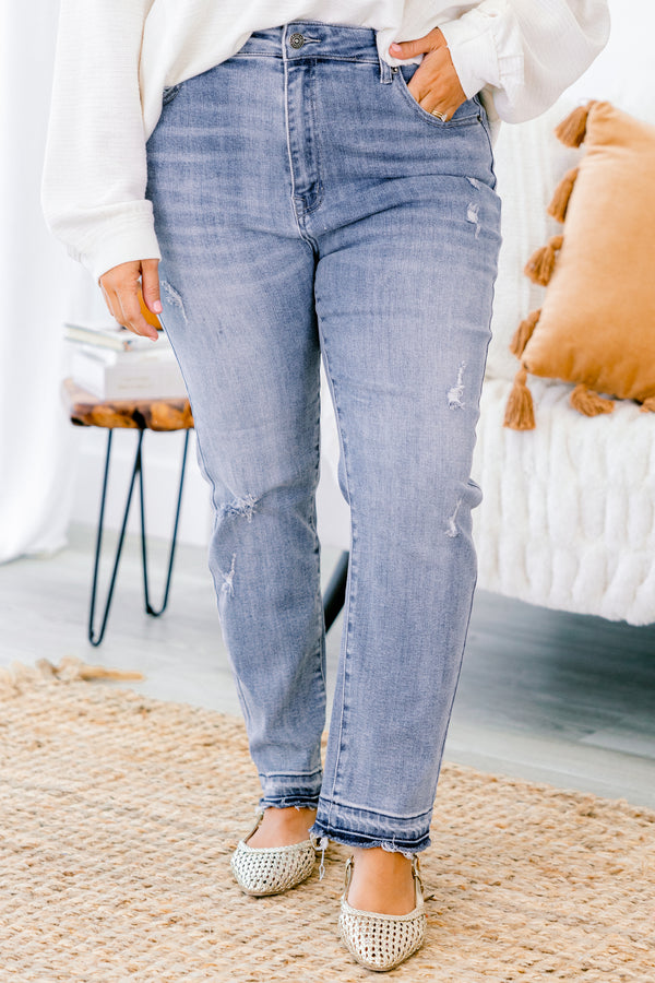 Chic Soul plus size clothing, light washed straight jeans with distressed details on each pant leg and small fringe details at the end of the jeans 
