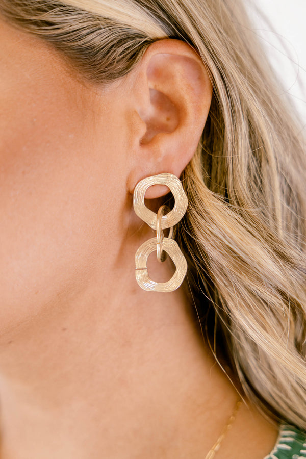 Chic Soul plus size clothing, gold dangle earing that has three hoops linking to one another 