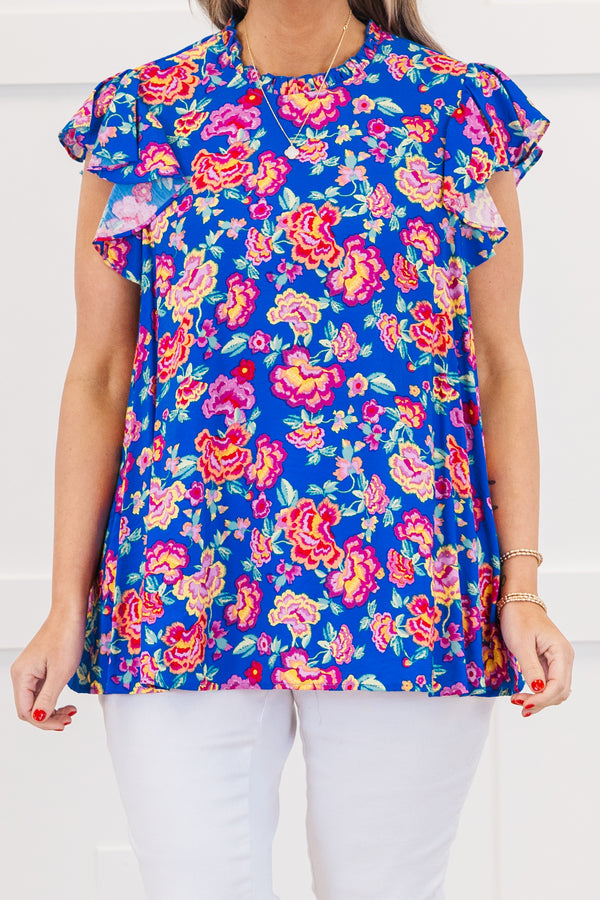 Chic Soul plus size clothing, royal blue short sleeve top with ruffle round neckline with flutter ruffle sleeves with large multicolor pink floral print