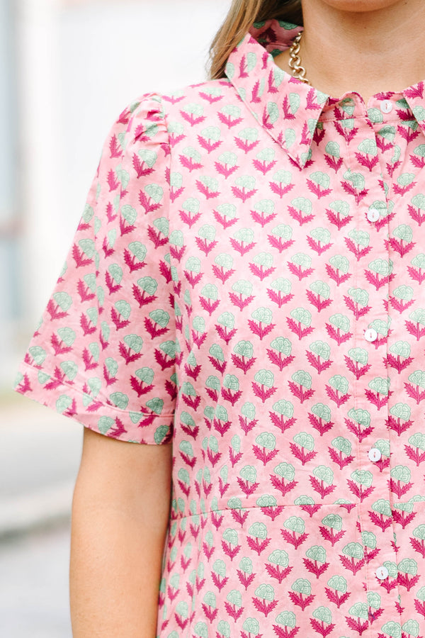 Plus Size pink medallion print maxi dress with a button-down front, collar, and short sleeves.