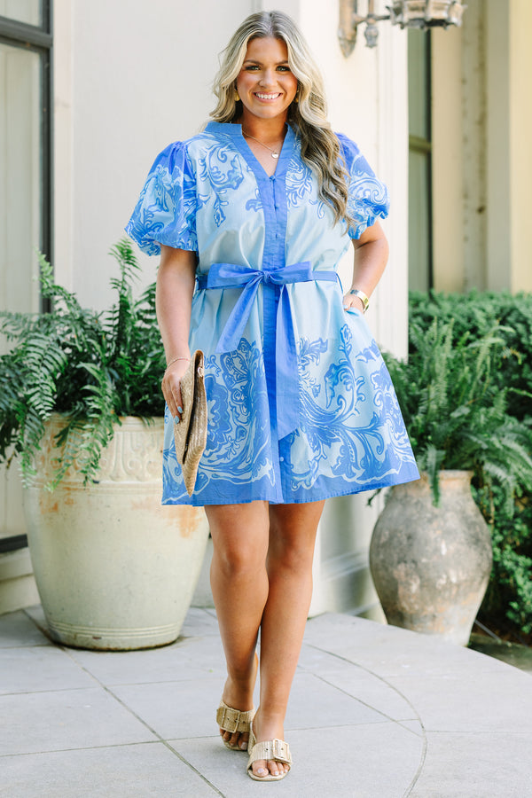 Plus Size blue mini dress with floral paisley print, puff sleeves, and a matching waist tie belt.