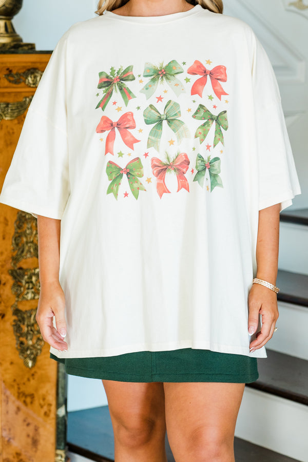 Chic Soul plus size clothing, short-sleeve ivory boyfriend tee with graphic art featuring red and green christmas bows and stars scattered around them