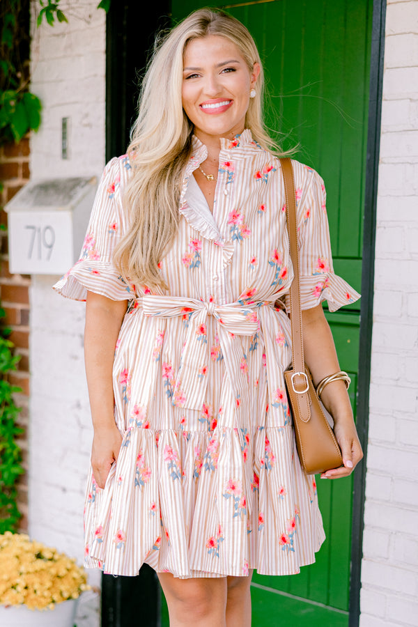 Chic Soul plus size clothing, beige striped dress with short sleeves that have a ruffle detail on the ends and a floral pattern throughout as well as a bow that ties around the waist 