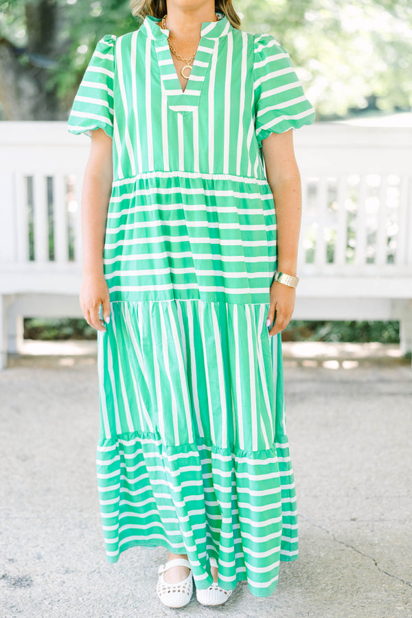 Plus size kelly green and white striped maxi dress with bubble sleeves and v-neckline.