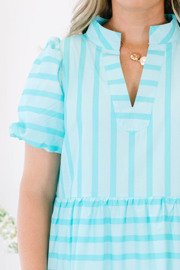 Plus Size turquoise striped maxi dress with a v-neckline, bubble sleeves, and a tiered skirt.