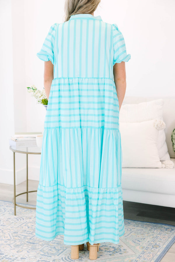 Plus Size turquoise striped maxi dress with a v-neckline, bubble sleeves, and a tiered skirt.