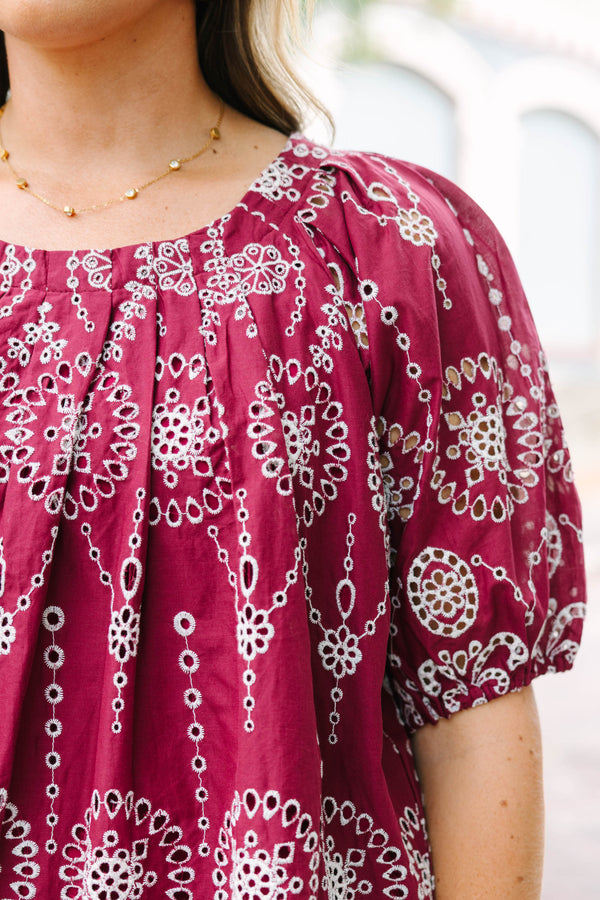 Plus Size burgundy eyelet top with elastic bubble sleeves and a scalloped hem.
