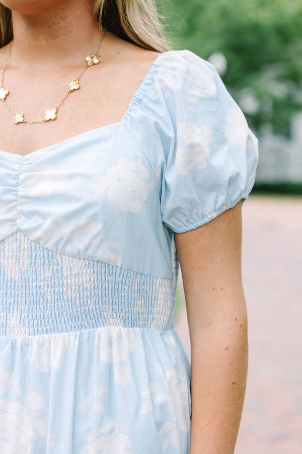 Plus Size baby blue floral maxi dress with puff sleeves, a smocked bodice, and a tiered skirt.