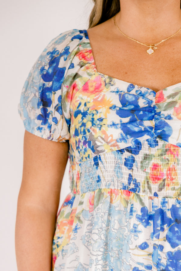 Chic Soul plus size clothing, light blue short puff sleeve maxi dress with blue, green, and coral pink floral pattern 