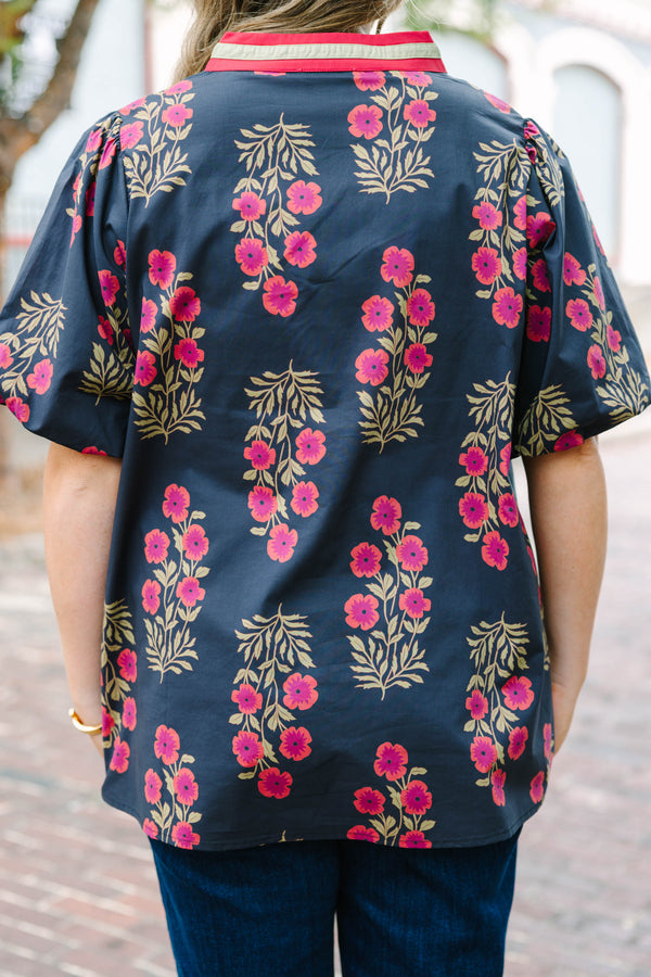 Plus Size black floral cotton top with bubble puff sleeves and a pink scalloped slit V-neckline.