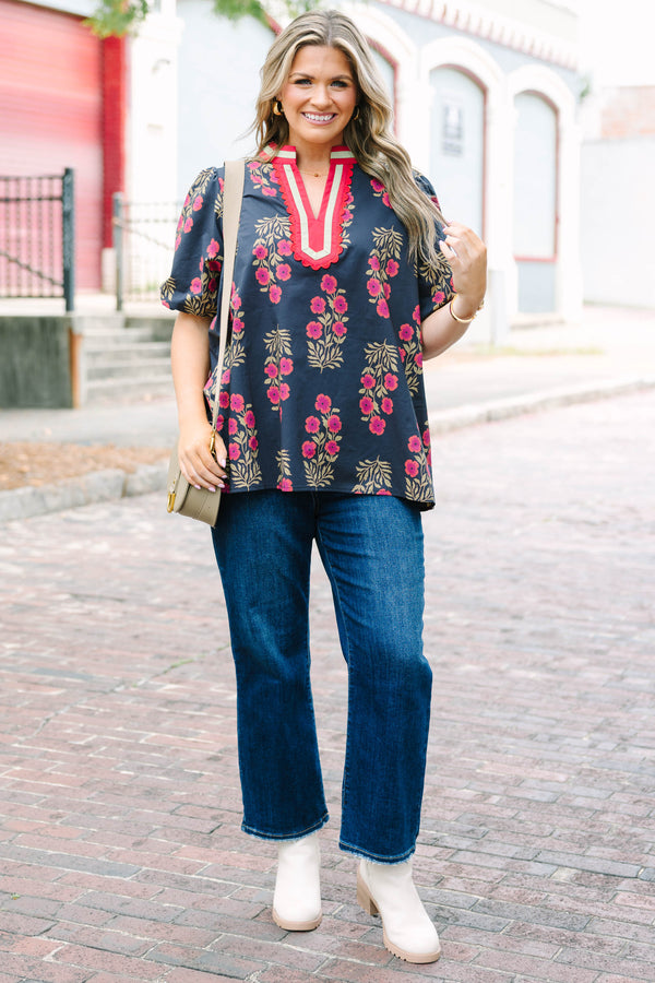Plus Size black floral cotton top with bubble puff sleeves and a pink scalloped slit V-neckline.