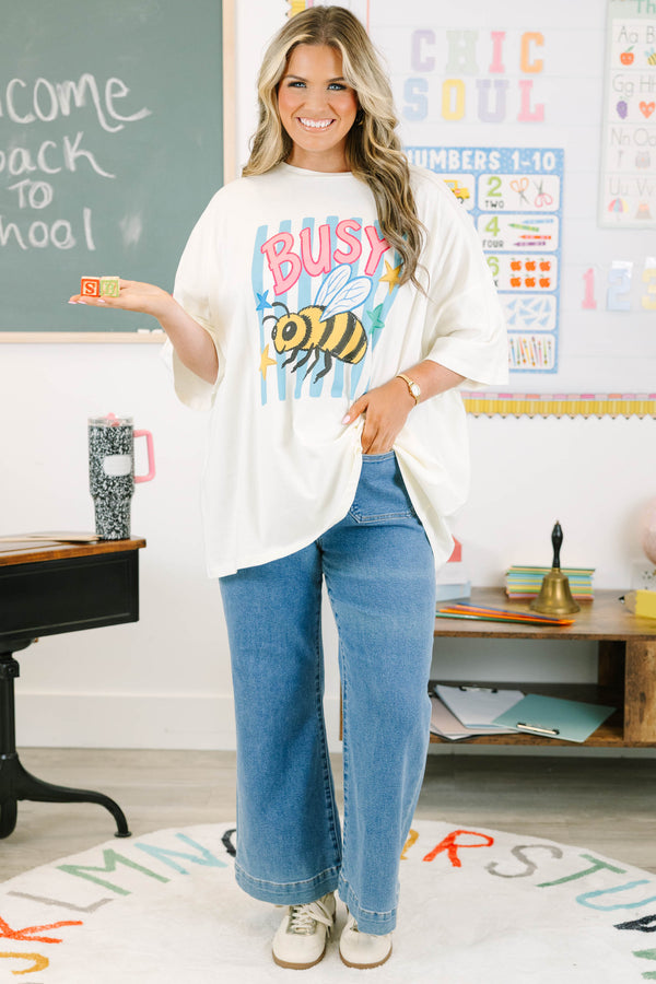 Plus size ivory oversized cotton boyfriend tee with a colorful busy bee graphic.