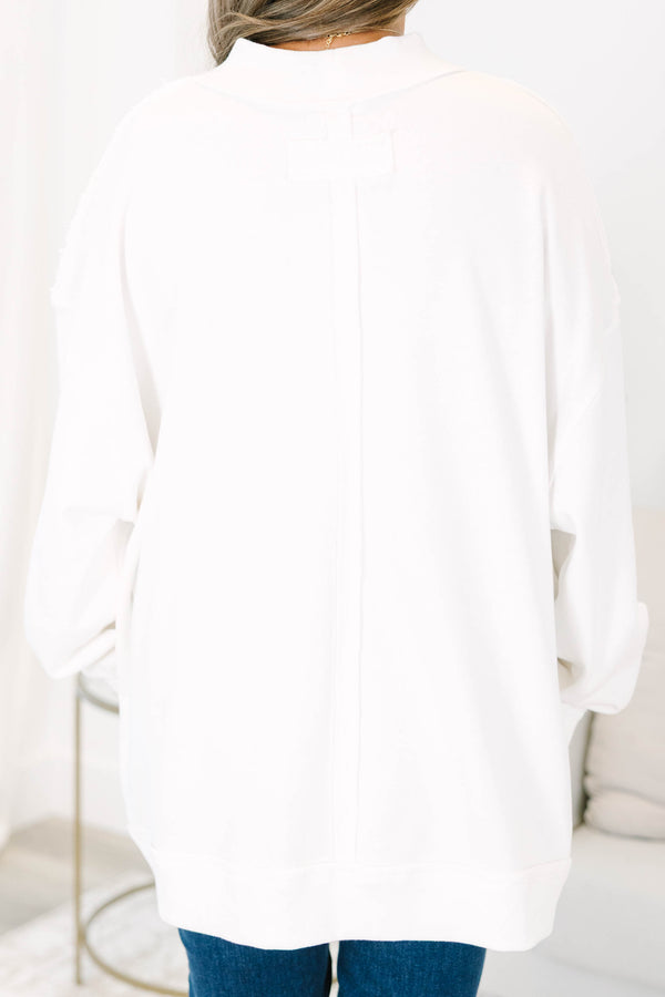 Ivory Caffeinated Moms Club mock neck pullover with a relaxed, flowy fit