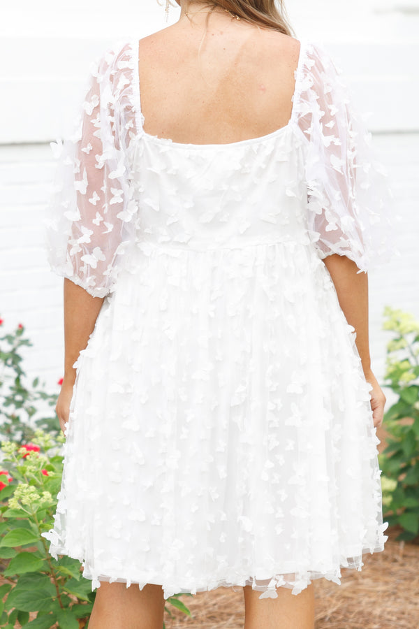 Chic Soul plus size clothing, white babydoll dress with sheer butterfly pattern and bubble sleeves