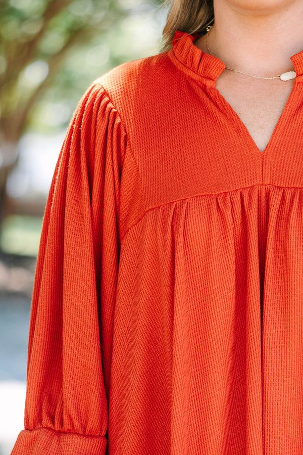 Rust colored short dress with high low hemline