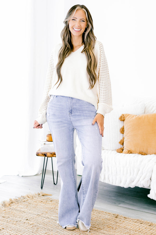 Chic Soul plus size clothing, light wash high rise flare jeans with distressed hem