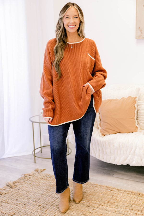 Chic Soul plus size clothing, rust orange long sleeve knit sweater with white piping along the collar, sleeves, hem, and front pocket