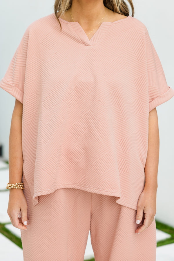 Chic Soul plus size clothing, short sleeve pink top with ribbed abstract pattern with v cutout along neckline with cuff sleeves