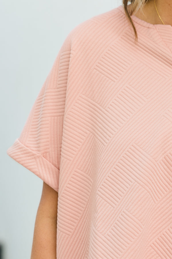 Chic Soul plus size clothing, short sleeve pink top with ribbed abstract pattern with v cutout along neckline with cuff sleeves