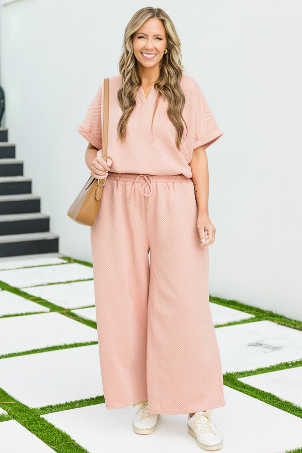 Chic Soul plus size clothing, short sleeve pink top with ribbed abstract pattern with v cutout along neckline with cuff sleeves