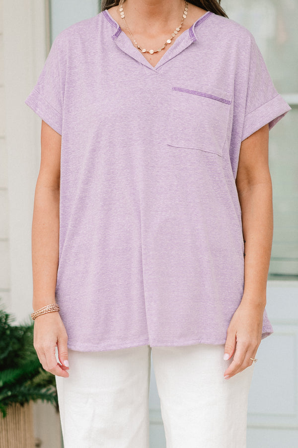 Chic Soul plus size clothing, short sleeve lilac top with small v-neck and darker purple stitching with a pocket