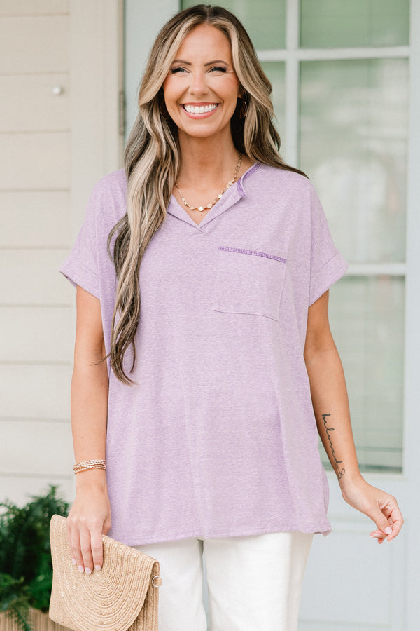 Chic Soul plus size clothing, short sleeve lilac top with small v-neck and darker purple stitching with a pocket