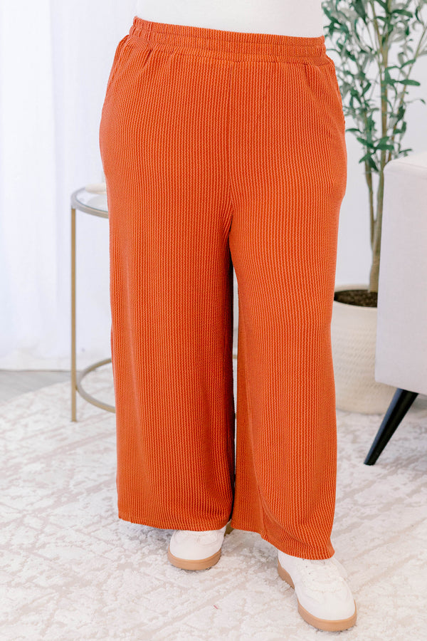 Chic Soul plus size clothing, orange mid waisted straight ribbed pants with pockets and a stretchy waistband