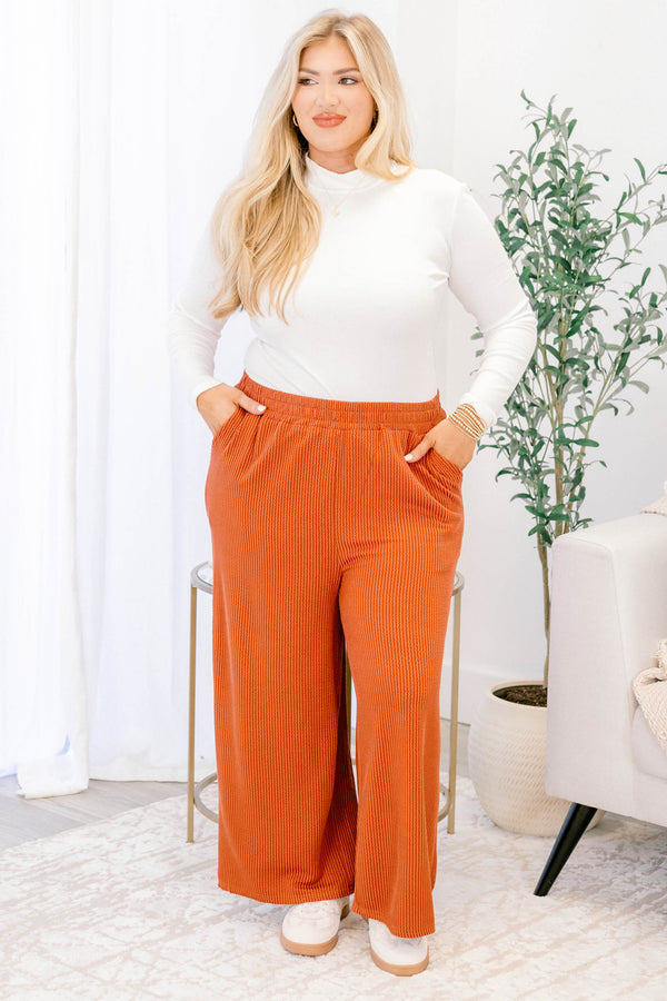 Chic Soul plus size clothing, orange mid waisted straight ribbed pants with pockets and a stretchy waistband