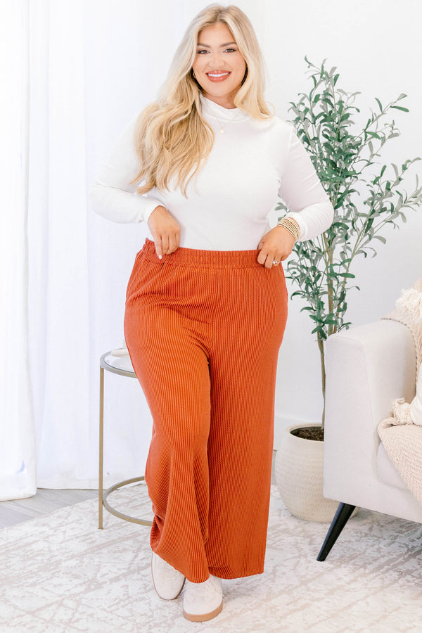 Chic Soul plus size clothing, orange mid waisted straight ribbed pants with pockets and a stretchy waistband