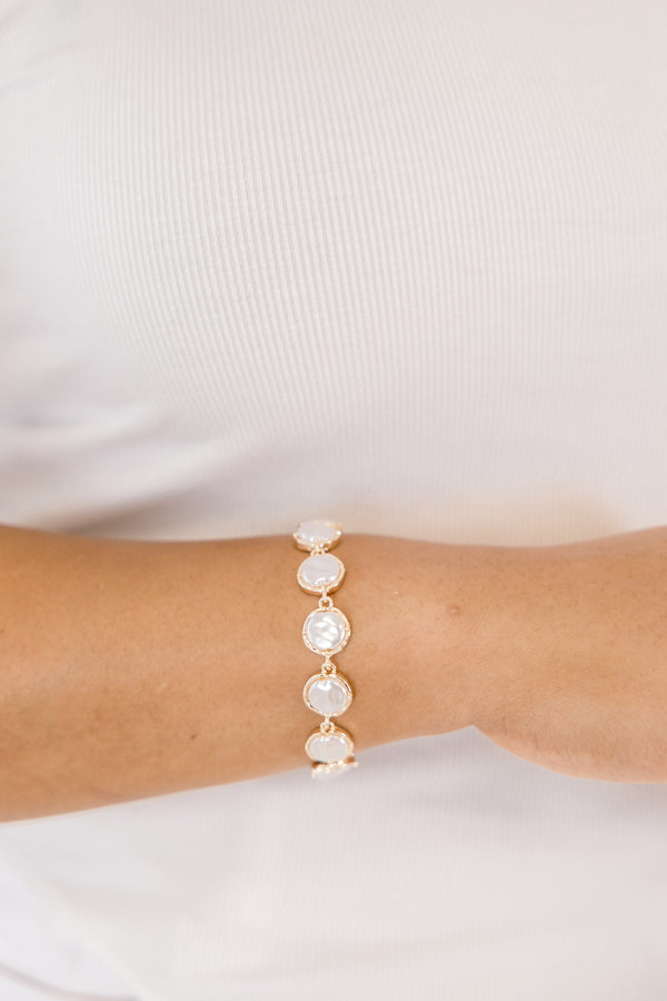 Chic Soul plus size clothing, gold bracelet with round pearls attaching to one another going around the bracelet 
