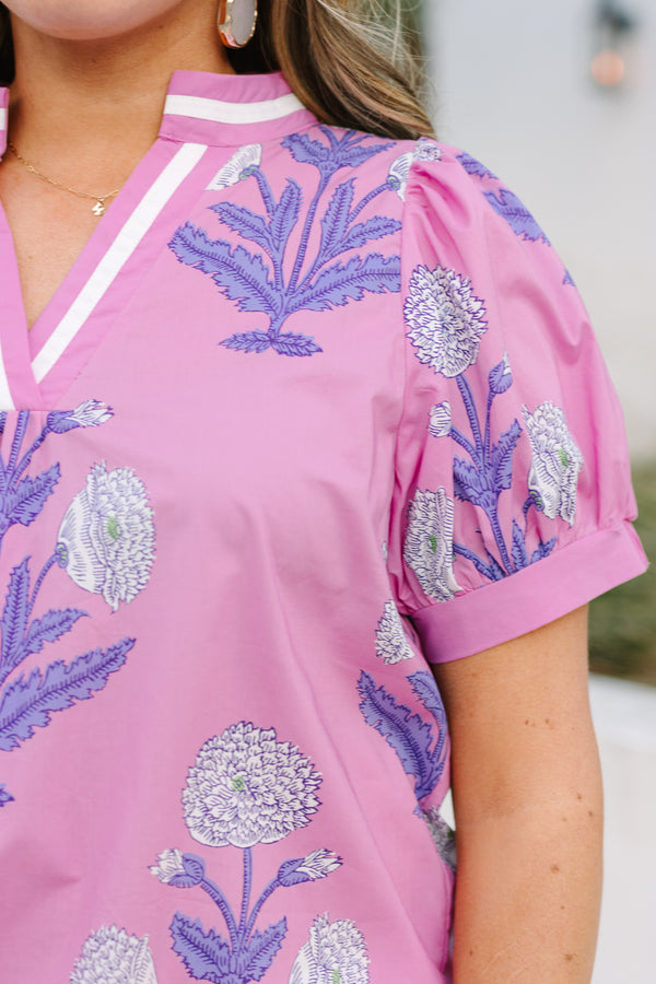 Chic Soul plus size clothing, pink top with bubble sleeves a pink and white stripe detail going along the v-neckline as well as a floral block pattern throughout 