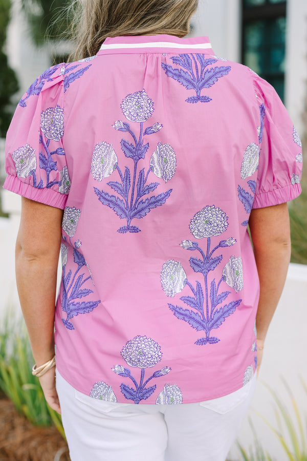 Chic Soul plus size clothing, pink top with bubble sleeves a pink and white stripe detail going along the v-neckline as well as a floral block pattern throughout 