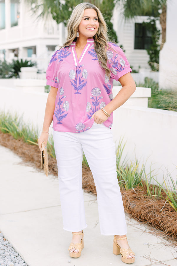Chic Soul plus size clothing, pink top with bubble sleeves a pink and white stripe detail going along the v-neckline as well as a floral block pattern throughout 