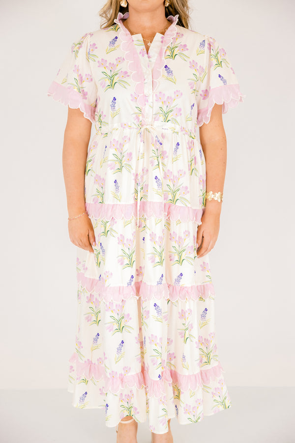 Chic Soul plus size clothing, cream short sleeve dress with pink and green floral pattern inside dress and pink scallop trim on the sleeves and pink scallop trim on tiers of skirt