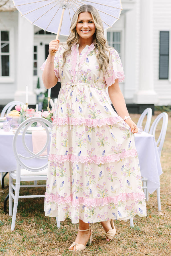 Chic Soul plus size clothing, cream short sleeve dress with pink and green floral pattern inside dress and pink scallop trim on the sleeves and pink scallop trim on tiers of skirt