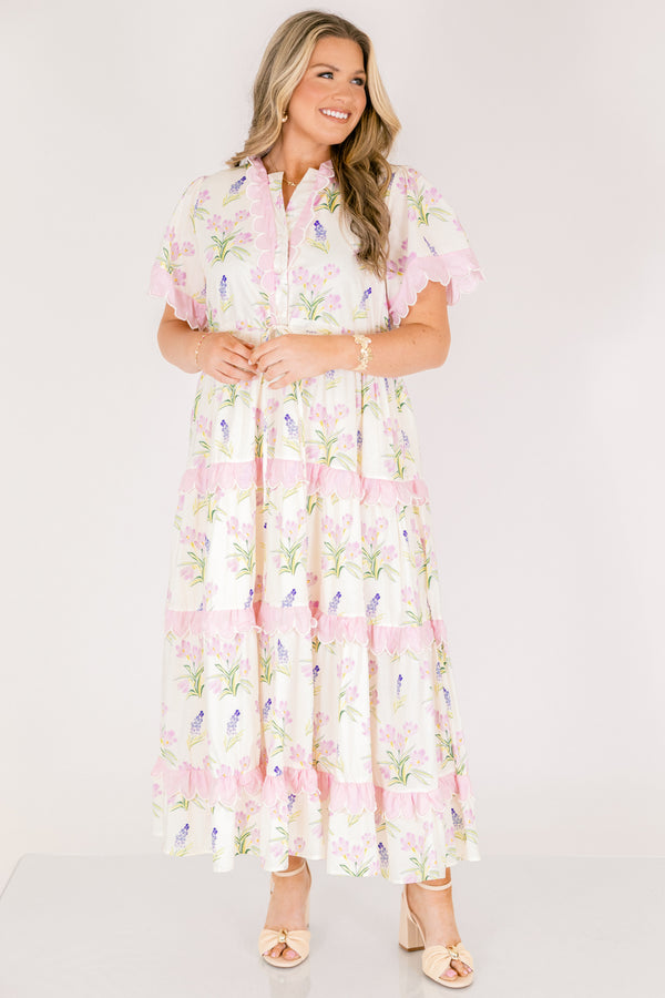 Chic Soul plus size clothing, cream short sleeve dress with pink and green floral pattern inside dress and pink scallop trim on the sleeves and pink scallop trim on tiers of skirt