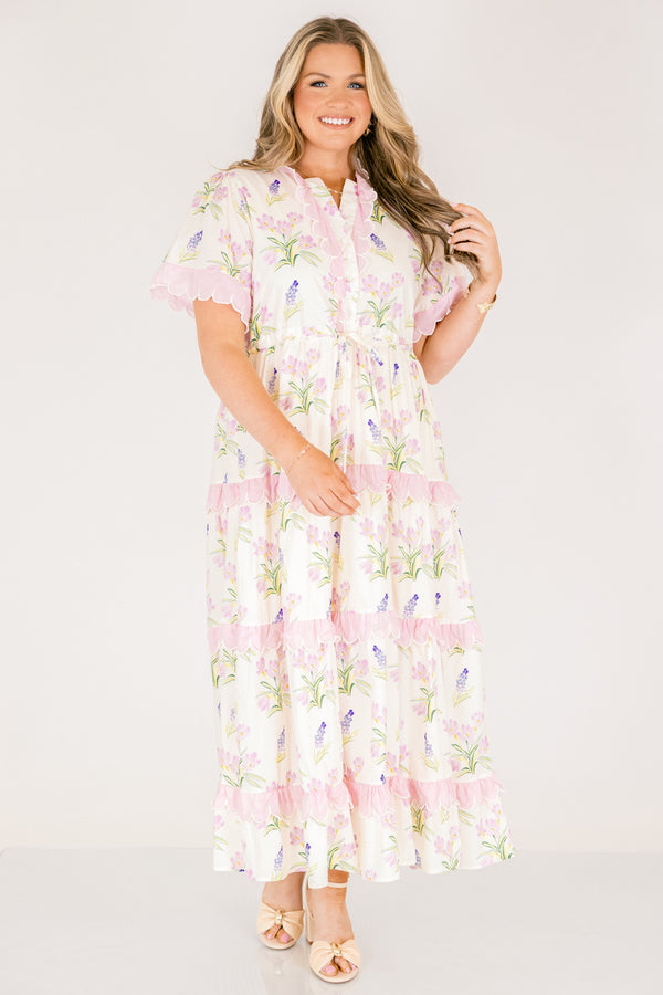 Chic Soul plus size clothing, cream short sleeve dress with pink and green floral pattern inside dress and pink scallop trim on the sleeves and pink scallop trim on tiers of skirt