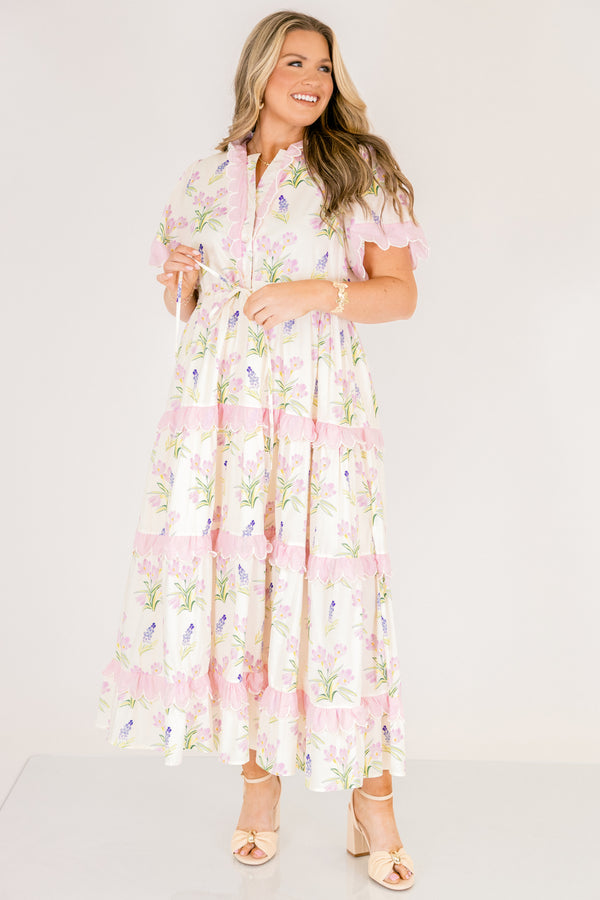 Chic Soul plus size clothing, cream short sleeve dress with pink and green floral pattern inside dress and pink scallop trim on the sleeves and pink scallop trim on tiers of skirt