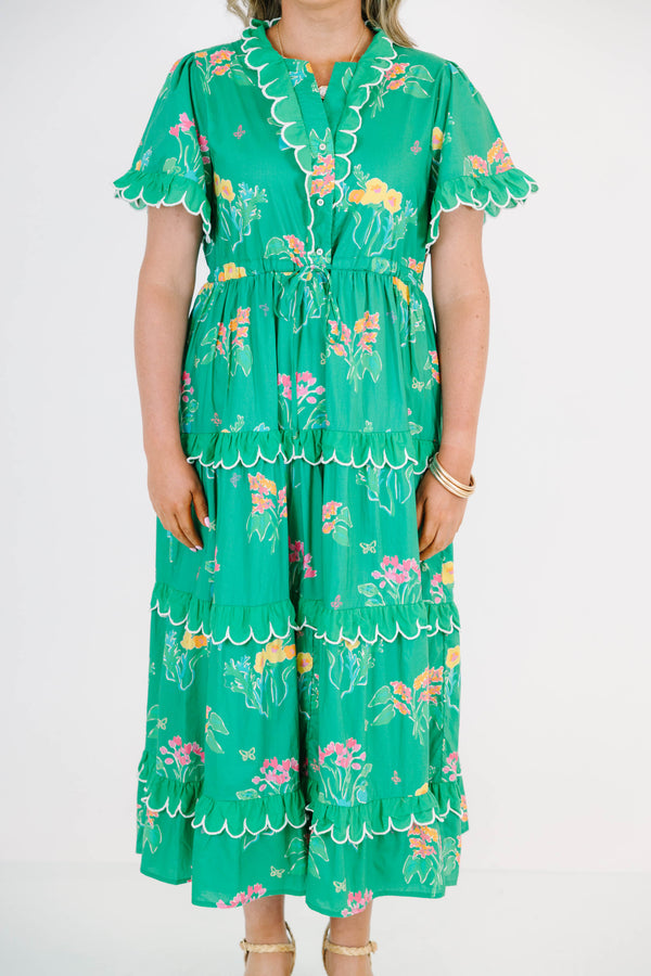 Plus Size green tiered midi dress with floral print, scalloped trim, and short flutter sleeves.