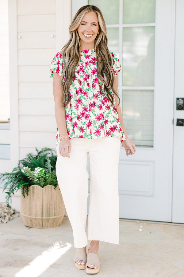 Chic Soul plus size clothing, short-sleeve ivory top with a subtle mock neck and a pink and green floral pattern 