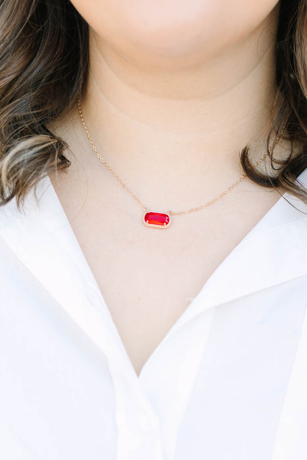 Plus Size gold chain necklace featuring a horizontal rectangular red gemstone pendant.