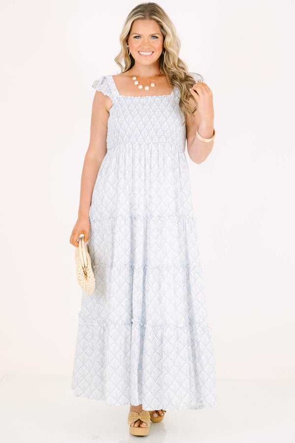 Plus Size blue and white patterned tiered maxi dress with smocked bodice and ruffled straps.
