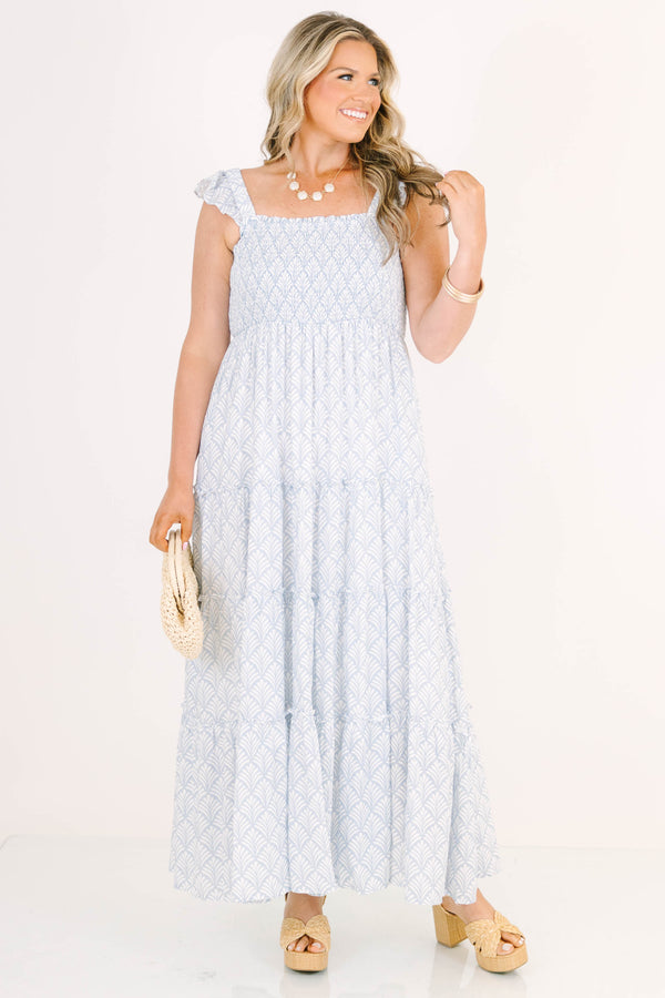 Plus Size blue and white patterned tiered maxi dress with smocked bodice and ruffled straps.