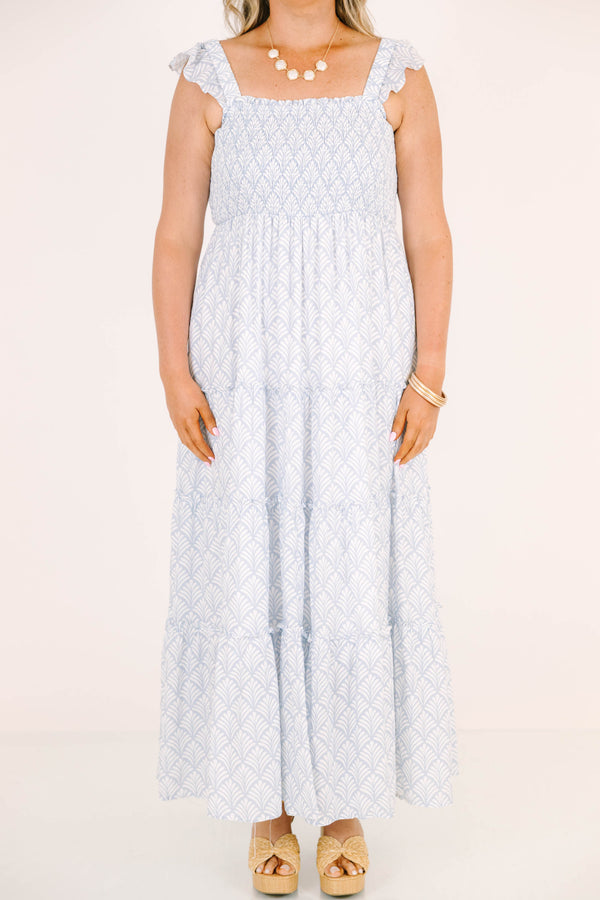 Plus Size blue and white patterned tiered maxi dress with smocked bodice and ruffled straps.