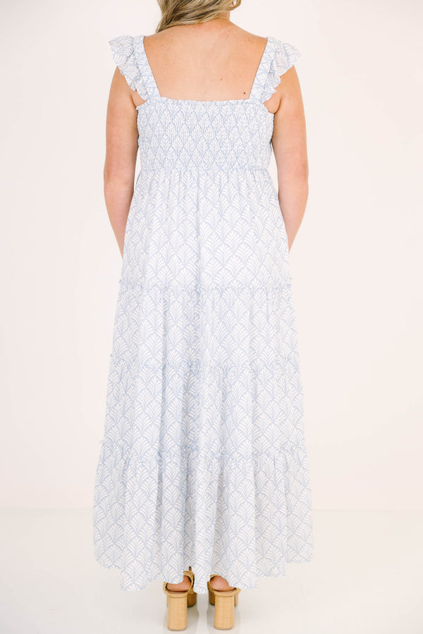 Plus Size blue and white patterned tiered maxi dress with smocked bodice and ruffled straps.