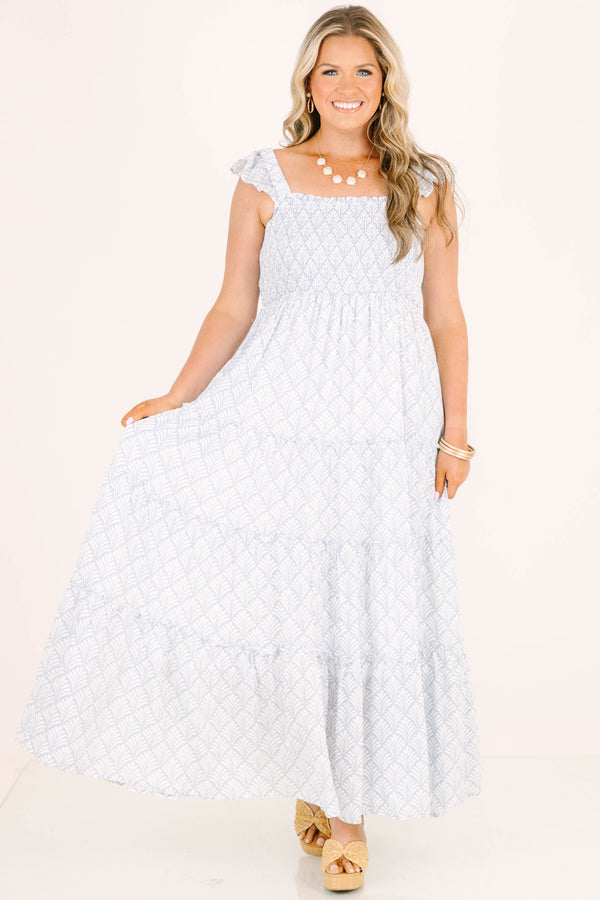 Plus Size blue and white patterned tiered maxi dress with smocked bodice and ruffled straps.